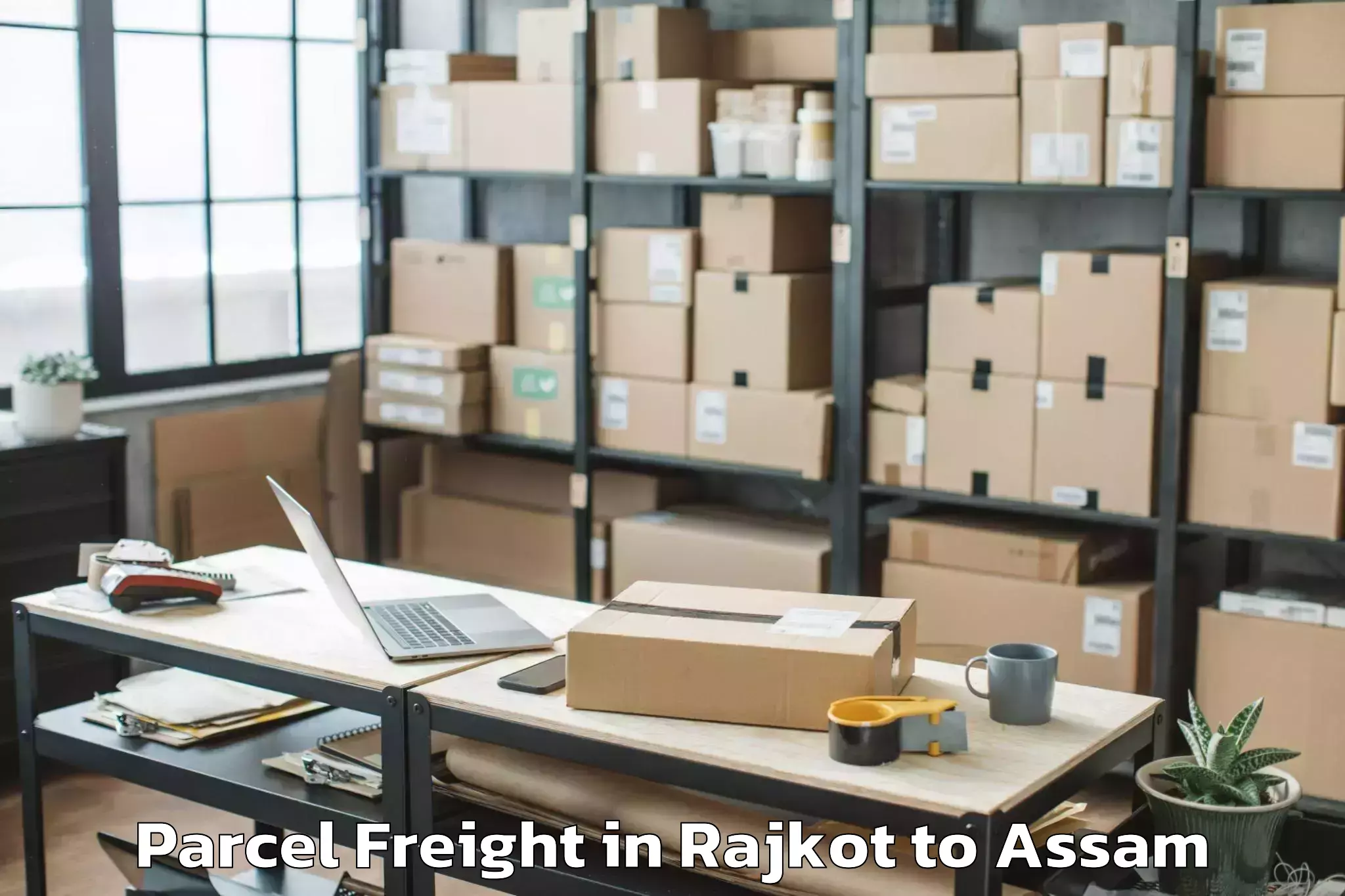 Leading Rajkot to Rupahi Parcel Freight Provider